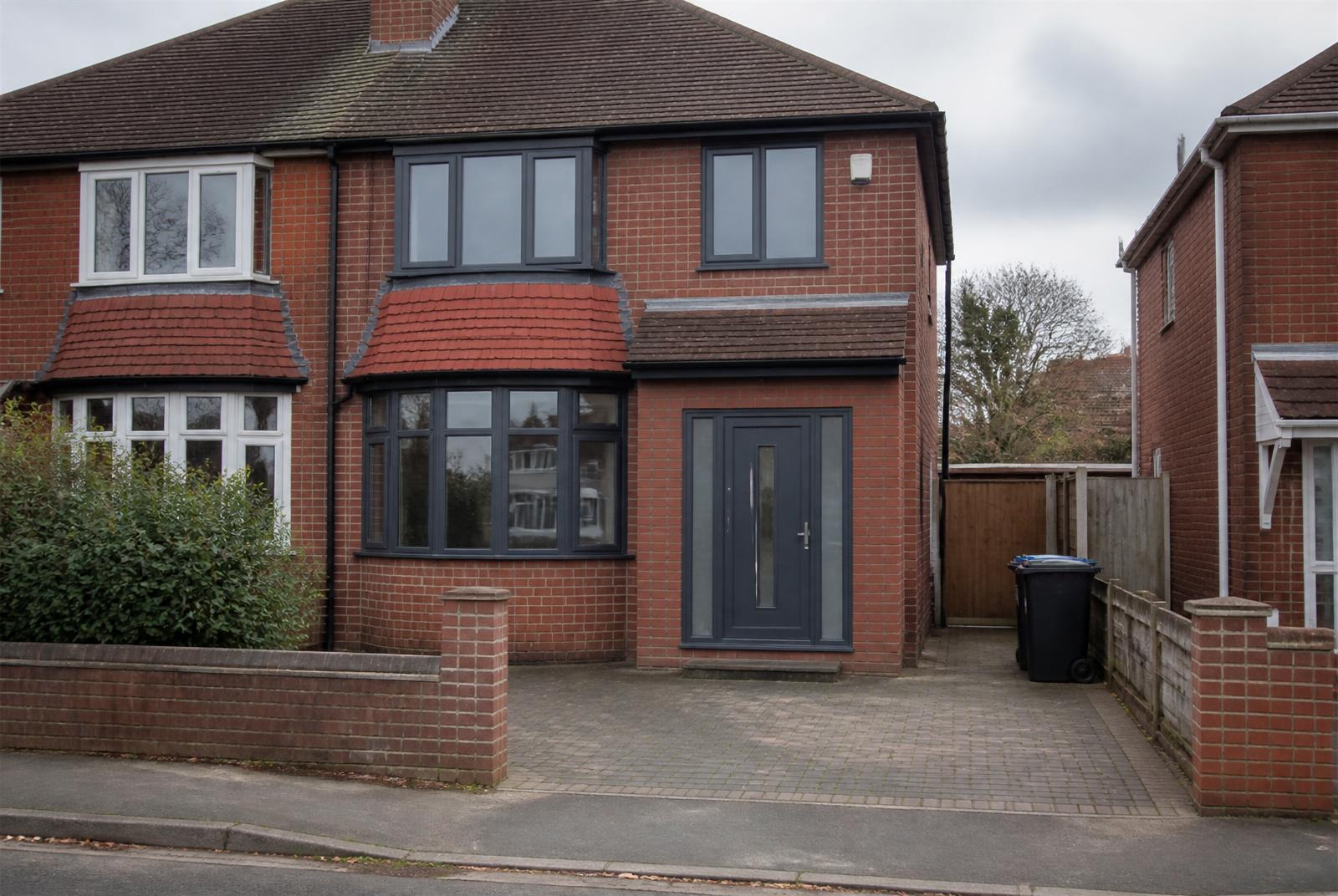 Modern anthracite windows and composite door fitted to a Wirral home